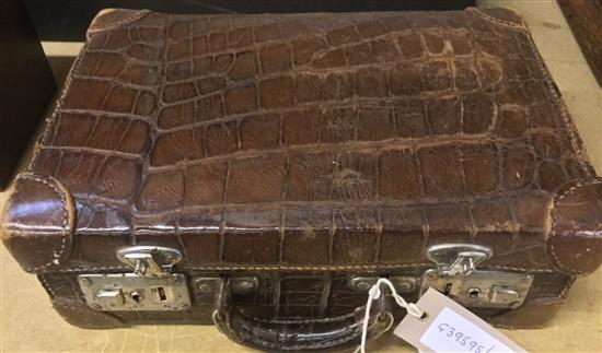 Small crocodile skin suitcase